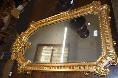 Lot 336 - Reproduction gilt framed wall mirror, 94cm high