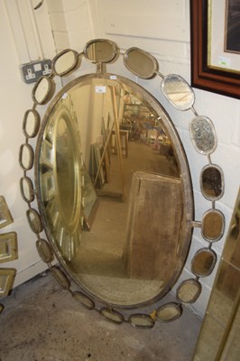 Lot 389 - Large modern oval bevelled wall mirror in...