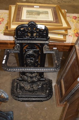 Lot 854 - Cast iron stick stand together with a cast...