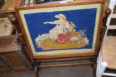 Lot 856 - Tapestry fire screen on barley twist supports