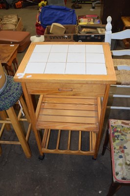 Lot 869 - Tile top kitchen cabinet