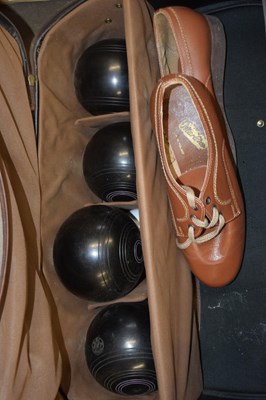 Lot 788 - Cased set of four garden bowls and shoes