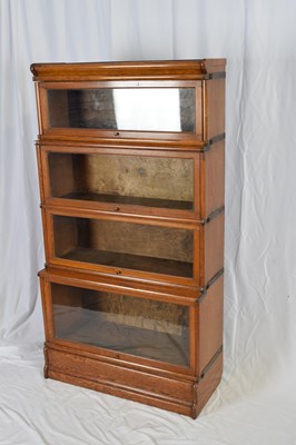 Lot 268 - Globe Wenicke, a four tier oak stacking...