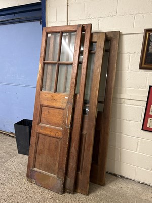 Lot 246 - A group of five oak and pine glazed internal...