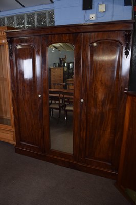 Lot 302 - Victorian mahogany wardrobe with triple doors,...