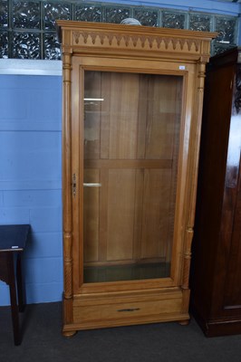 Lot 303 - Continental light oak bookcase or display...