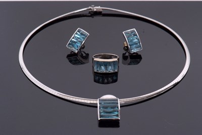 Lot 405 - An 18ct white gold and topaz suite after...