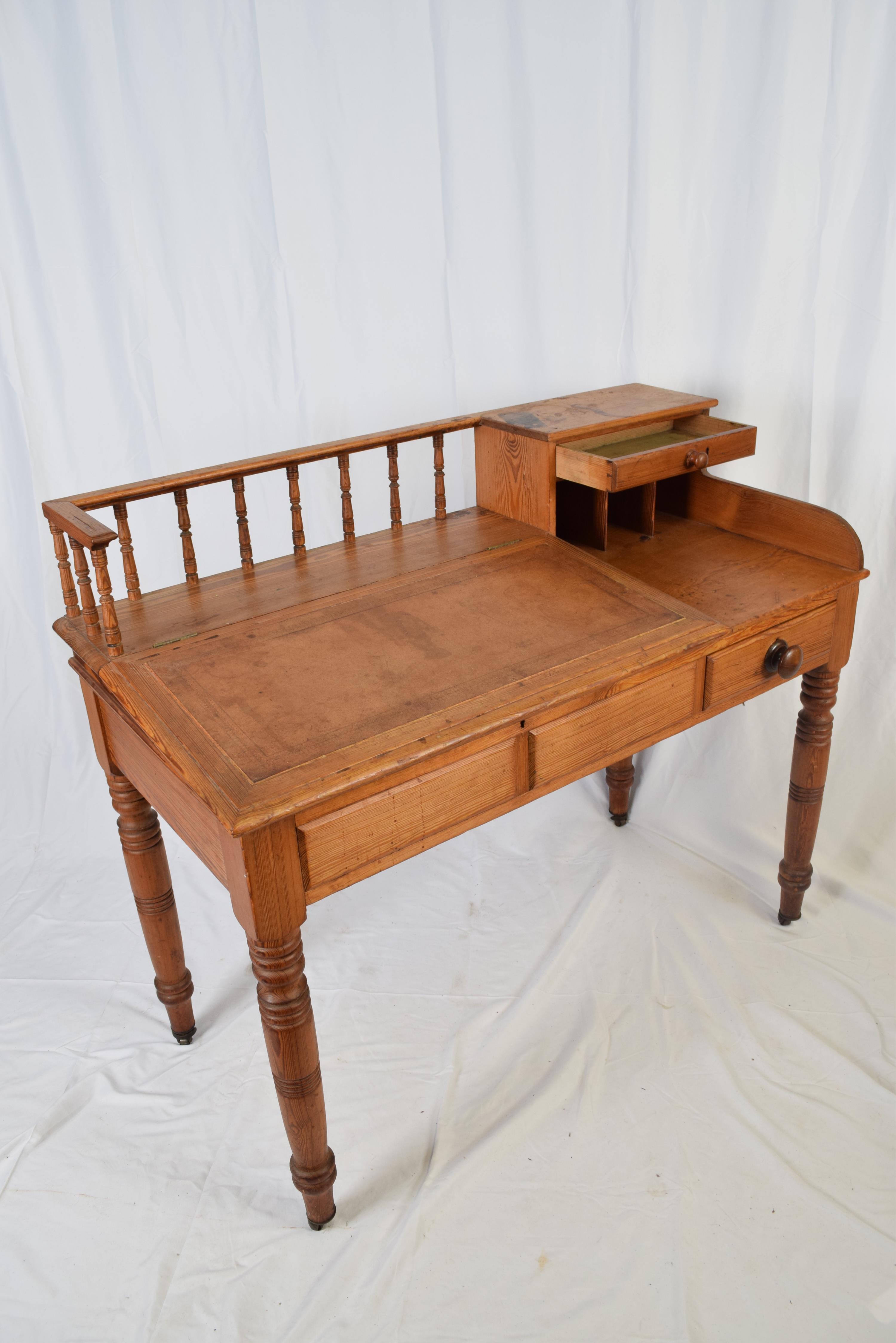 Lot 313 Victorian pitch pine desk with sloped hinged
