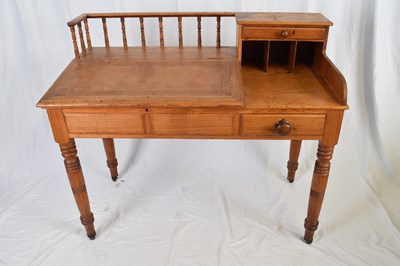 Lot 313 - Victorian pitch pine desk with sloped hinged...