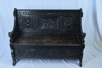 Lot 335 - Victorian dark Gothic oak hall seat, profusely...