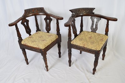 Lot 336 - Two Victorian oak corner chairs, the bowed...