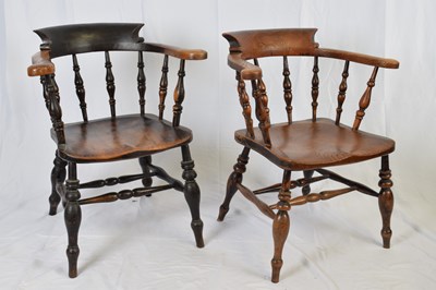 Lot 338 - Two Victorian elm seated bow back smokers or...