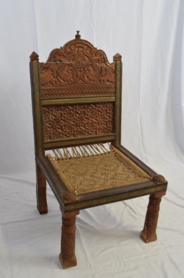 Lot 353 - Indian hardwood chair with heavily carved back...