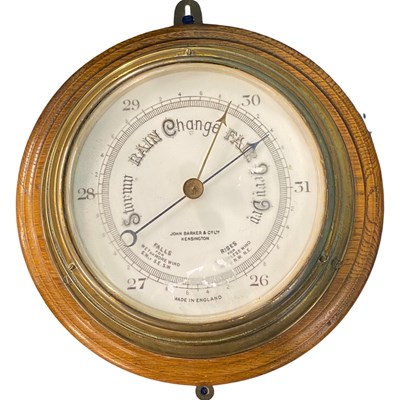 Lot 393 - A barometer mounted on wooden base by John...