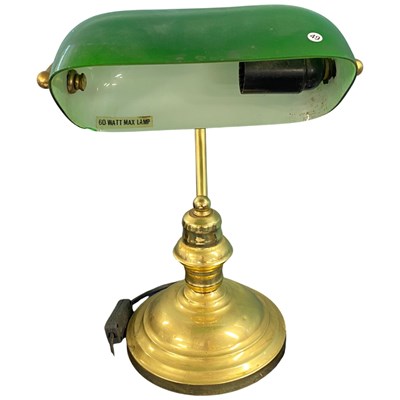 Lot 394 - A brass based bankers lamp with green glass shade