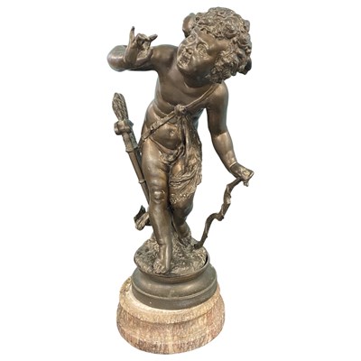 Lot 398 - Spelter model of a angel or winged cherub on...