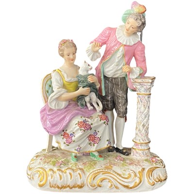 Lot 426 - Continental porcelain model of a lady and...