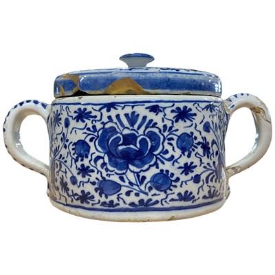 Lot 469 - 18th Century delft possett pot and cover