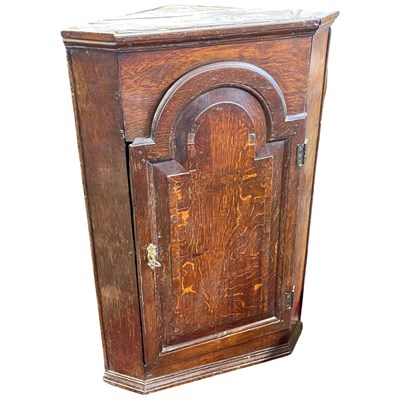 Lot 521 - 18th Century oak corner cabinet with arched...