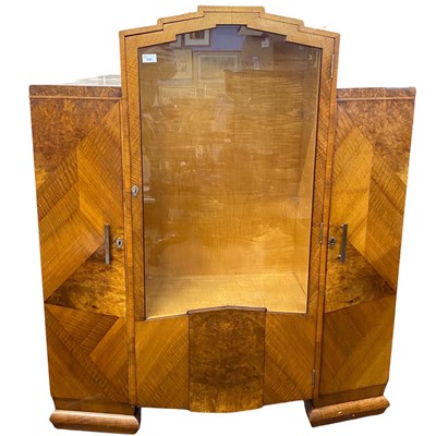 Lot 536 - An Art Deco style walnut veneered display...