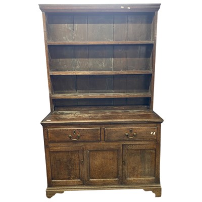 Lot 541 - Georgian oak dresser with shelved back over a...