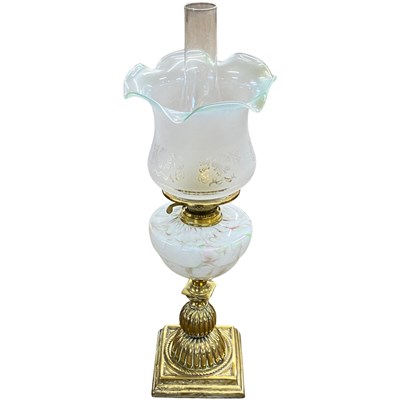 Lot 583 - A late 19th or early 20th Century oil lamp...