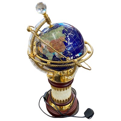 Lot 394A - An inlaid globe on stand, the countries inlaid...