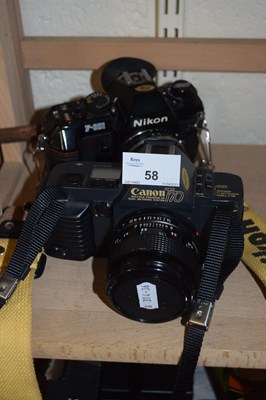 Lot 58 - Nikon F-301 camera together with a Canon T70...