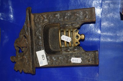 Lot 130 - Miniature cast iron and brass fire place, 23cm...