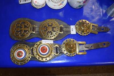 Lot 136 - Two leather straps of horse brasses