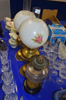 Lot 144 - Two brass based oil lamps and one other (3)