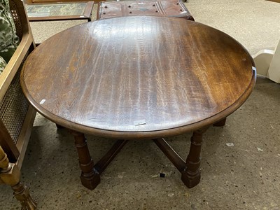 Lot 279 - Circular oak coffee table on turned legs