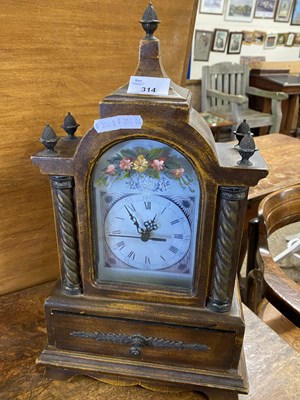 Lot 314 - Modern mantel clock with floral decoration and...