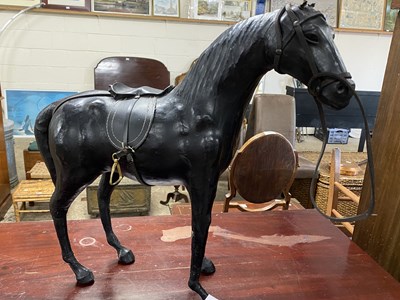 Lot 326 - Leather mounted model of a horse