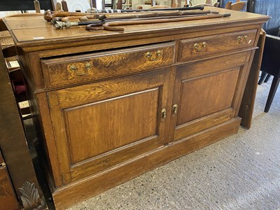 Lot 329 - Late Victorian oak two door two drawer sideboard