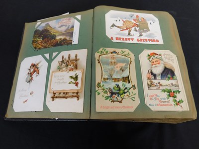 Lot 337 - Old battered postcard album containing 330...