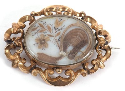 Lot 100 - A 19th century memorial brooch, the oval...