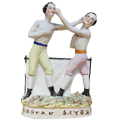 Lot 299 - A Staffordshire figure of Heenan and Sayers,...