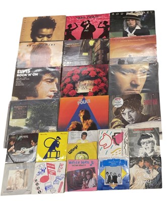 Lot 185 - A mixed lot of 12" vinyl LPs and some singles:...