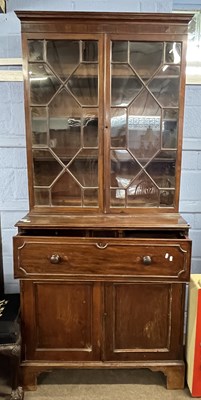 Lot 536 - A Georgian mahogany secretaire bookcase...