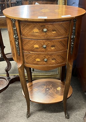 Lot 558 - A 20th Century continental side table of oval...