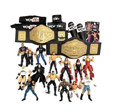 Lot 289 - A collection of NWO Wrestling figures, belts,...