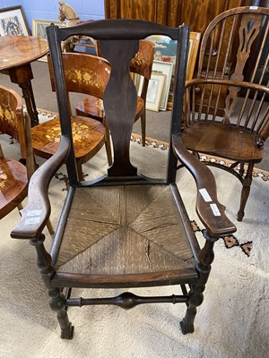 Lot 640 - A 19th Century rush seated carver chair on...