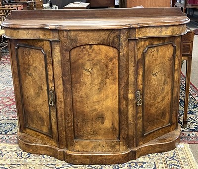 Lot 587 - A small Victorian walnut veneered credenza...