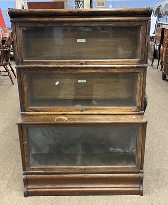 Lot 588 - A Globe Wernicke three tier stacking bookcase...