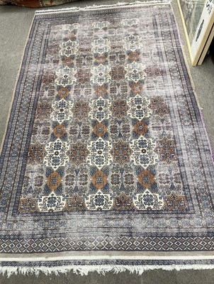 Lot 592 - 20th Century Middle Eastern shallow pile rug...