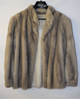 Lot 71 - A lady's grey fur jacket, with stand up collar...