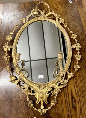 Lot 597 - 19th Century oval wall mirror in an elaborate...