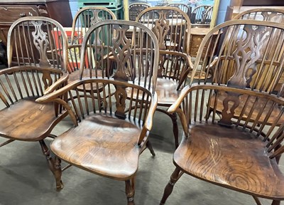 Lot 600 - A set of six reproduction elm seated Windsor...