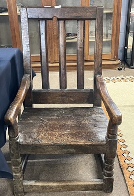 Lot 606 - A 17th or 18th Century oak elbow chair with...